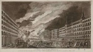 El grabado muestra el último incendio ocurrido en la plaza Mayor. Este pavoroso incendio, que se originó en la tienda de un mercader ubicada en el Portal de Paños, y que cambiaría su fisionomía, se produjo en el verano de 1790. Se prolongó durante nueve días y destruyó gran número de viviendas, ya que la mayoría tenian estructura de madera, salvandose solo un tercio de los edificios, entre ellos la Casa de la Panadería.